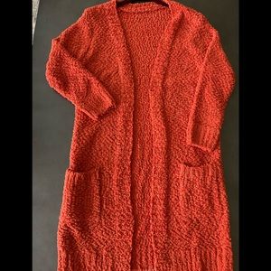 Beautiful Bright orange/coral knitted sweater size m-l. Great color for fall!